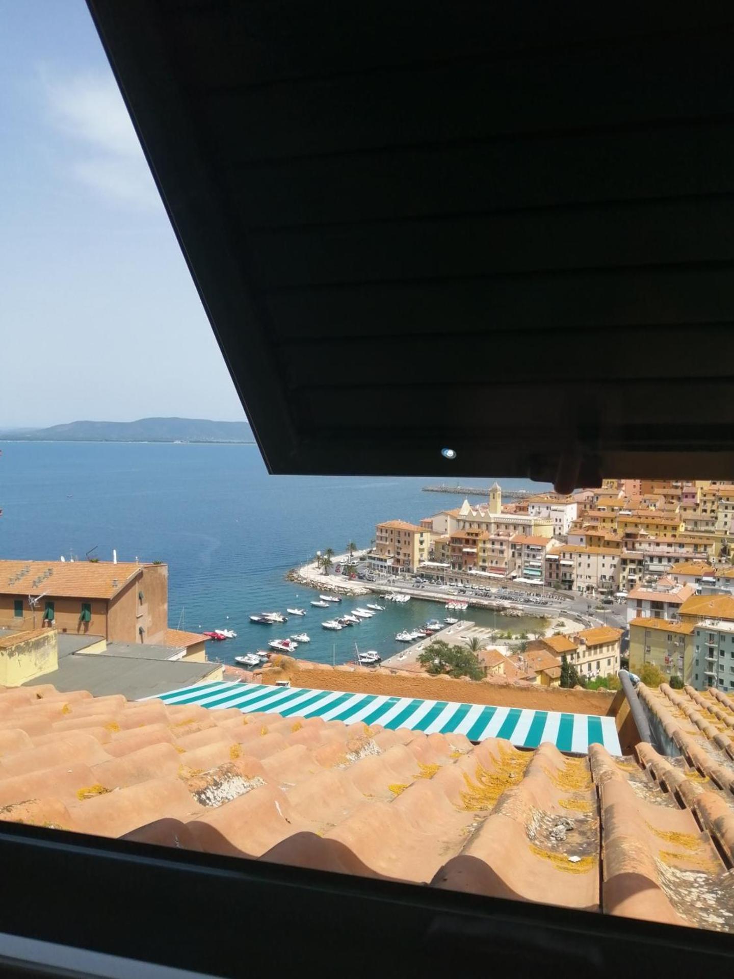 Апартаменты Panoramic House Порто Санто Стефано Экстерьер фото