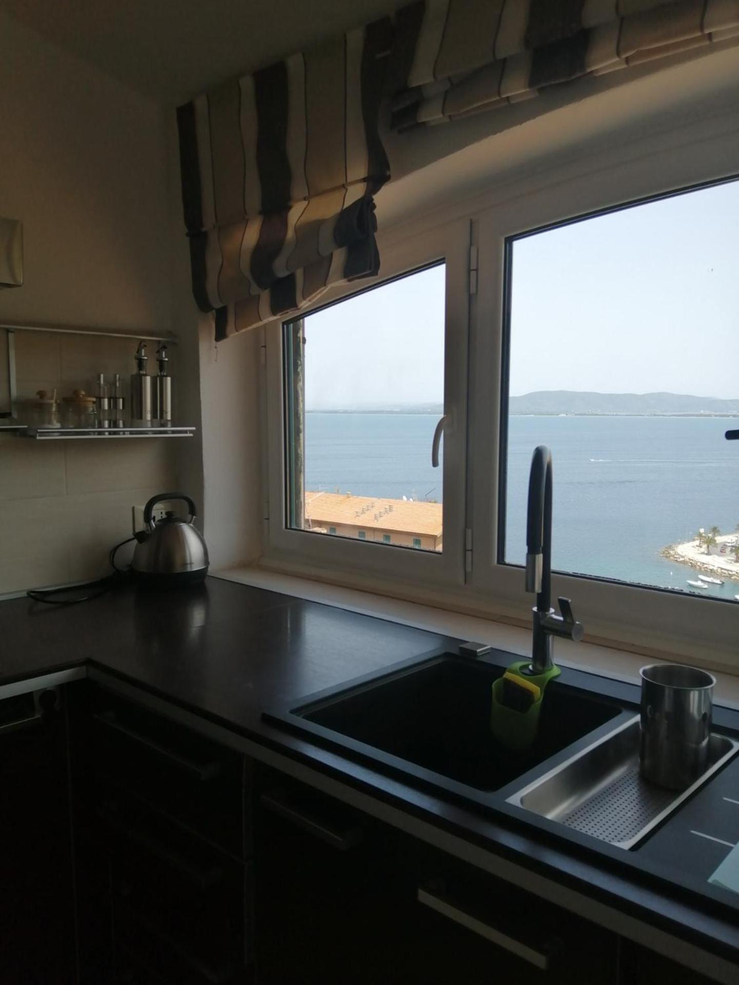 Апартаменты Panoramic House Порто Санто Стефано Экстерьер фото
