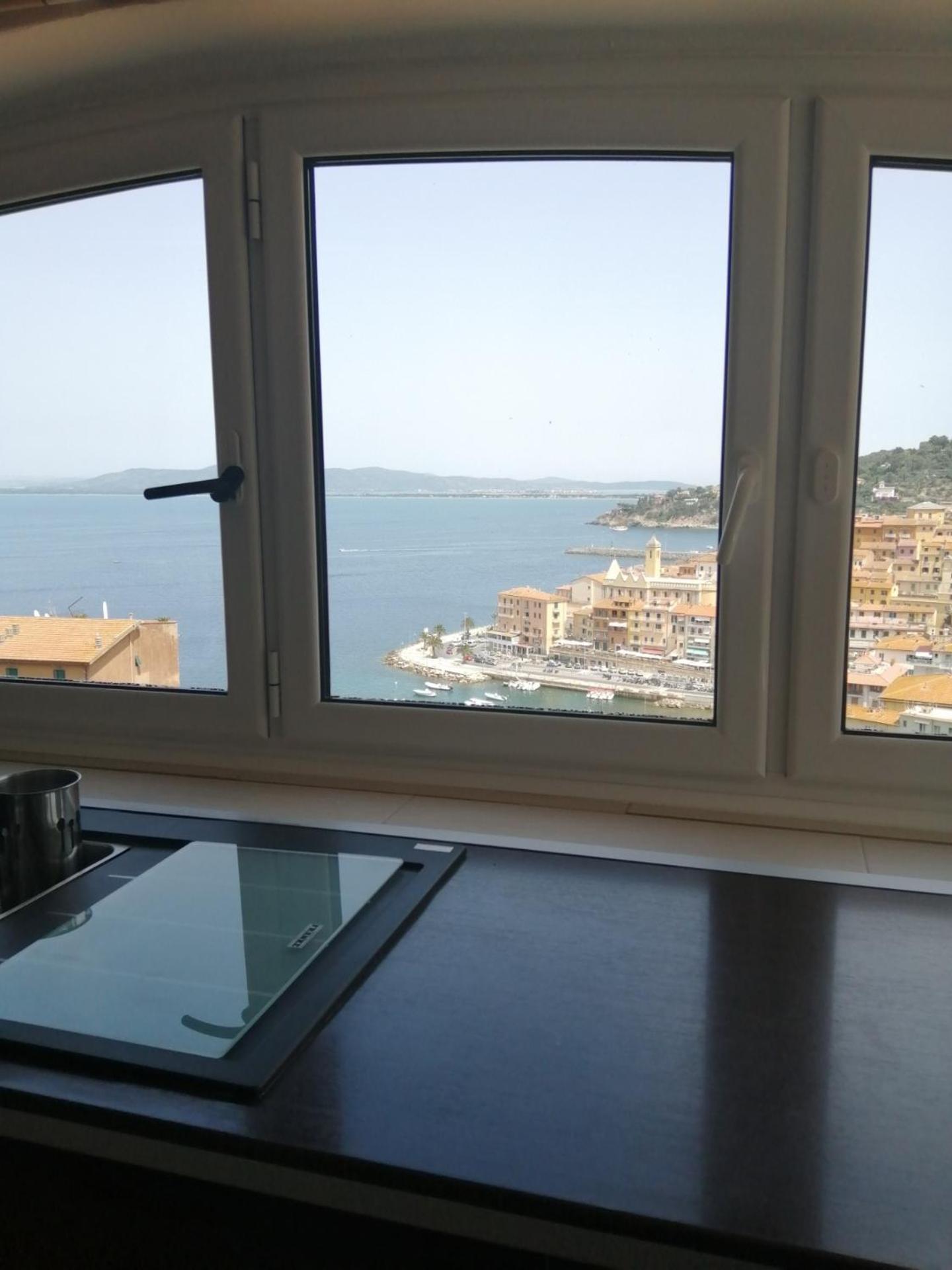 Апартаменты Panoramic House Порто Санто Стефано Экстерьер фото